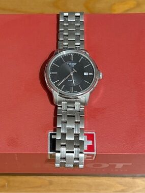Tissot Silver Stainless Steel Watch with Black Dial